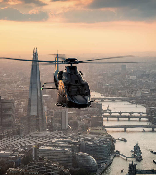Helicopter flying above city