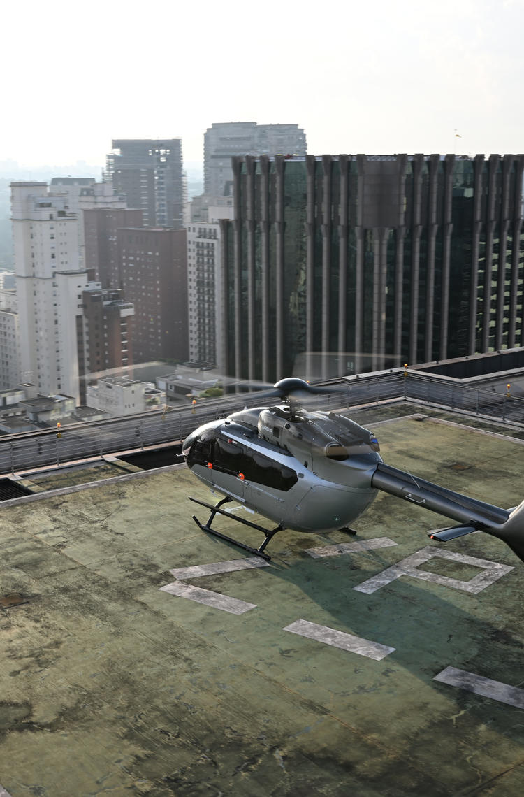 ACH145 Helicopter on a roof helipad in Sao Paulo, Brazil